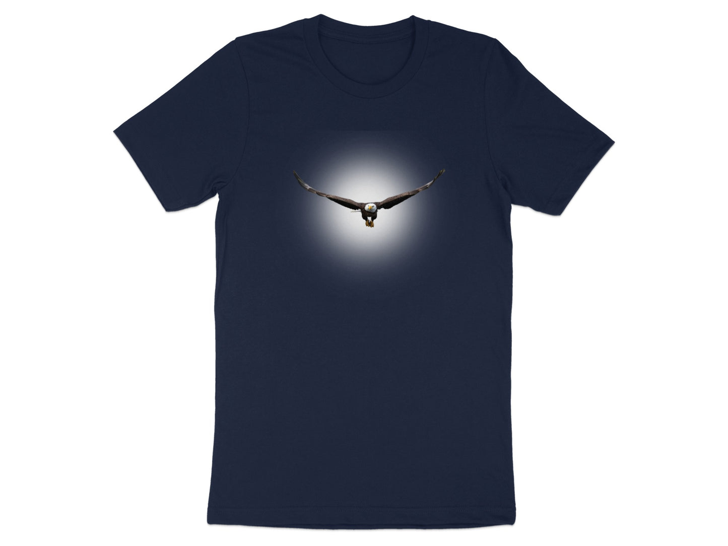 Bald eagle in flight with wings spread, centered against a light halo effect.