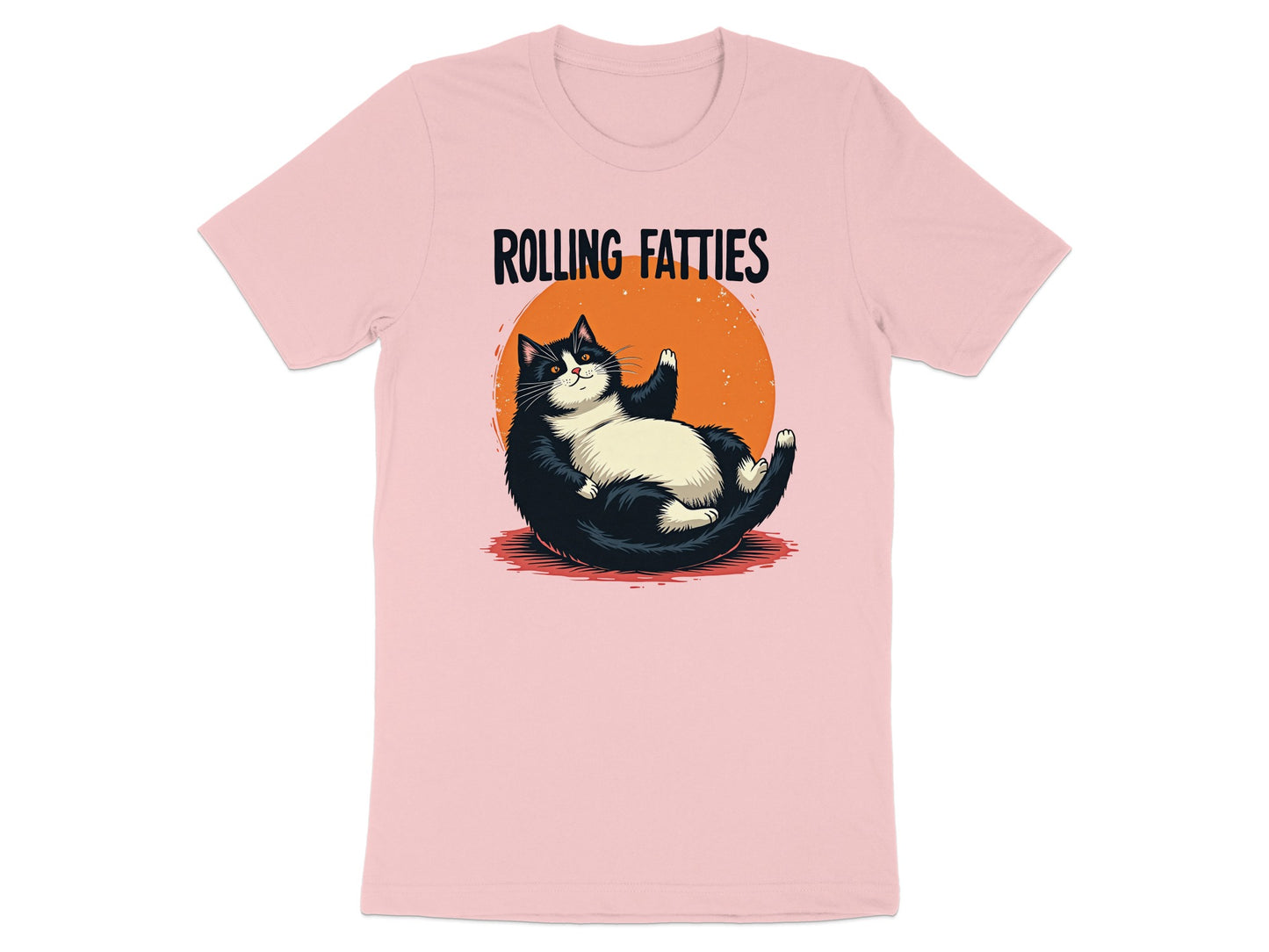 Pink t-shirt with a cartoon black and white cat rolling with a sun behind it.