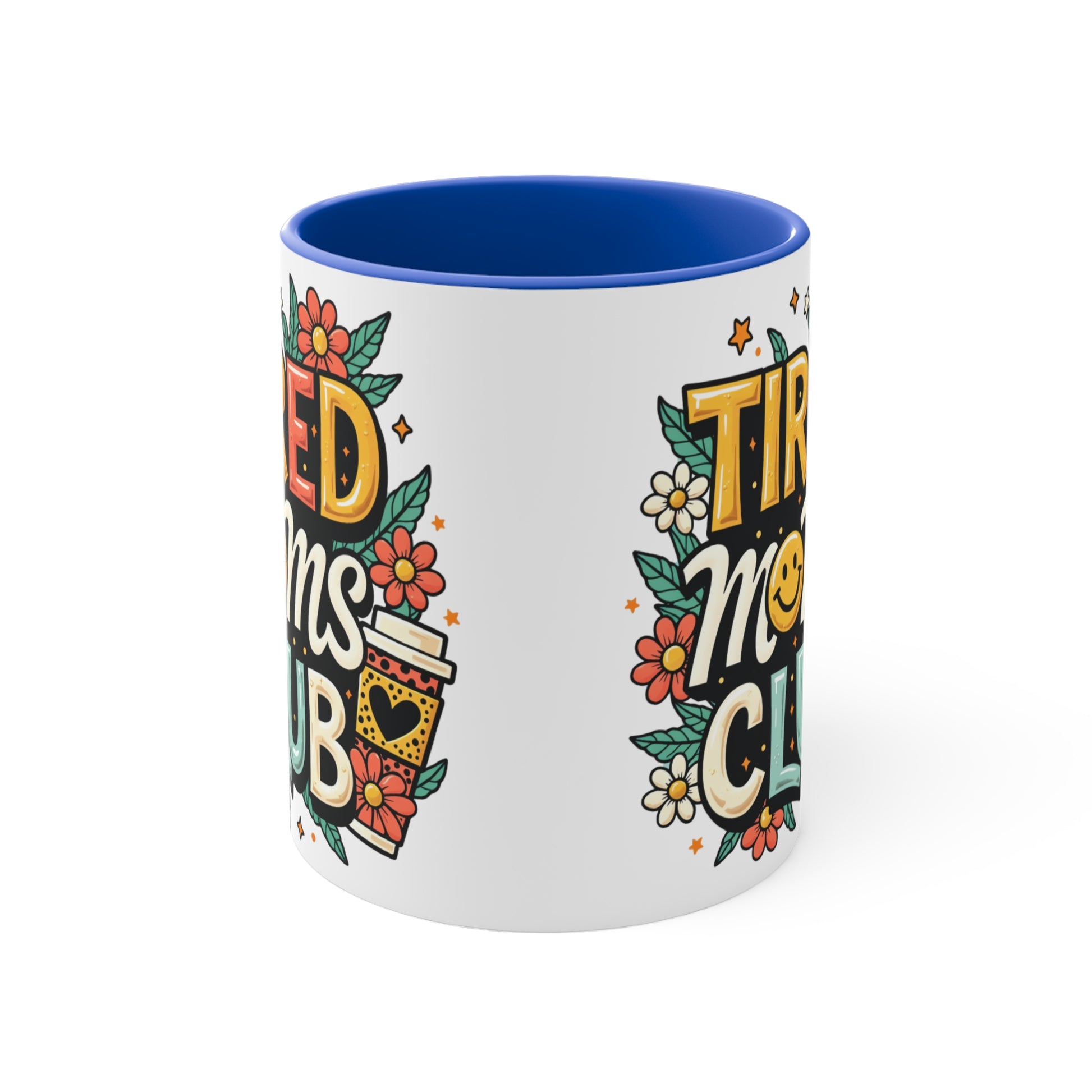 White mug with "Tired Moms Club" text and floral illustrations, blue interior.