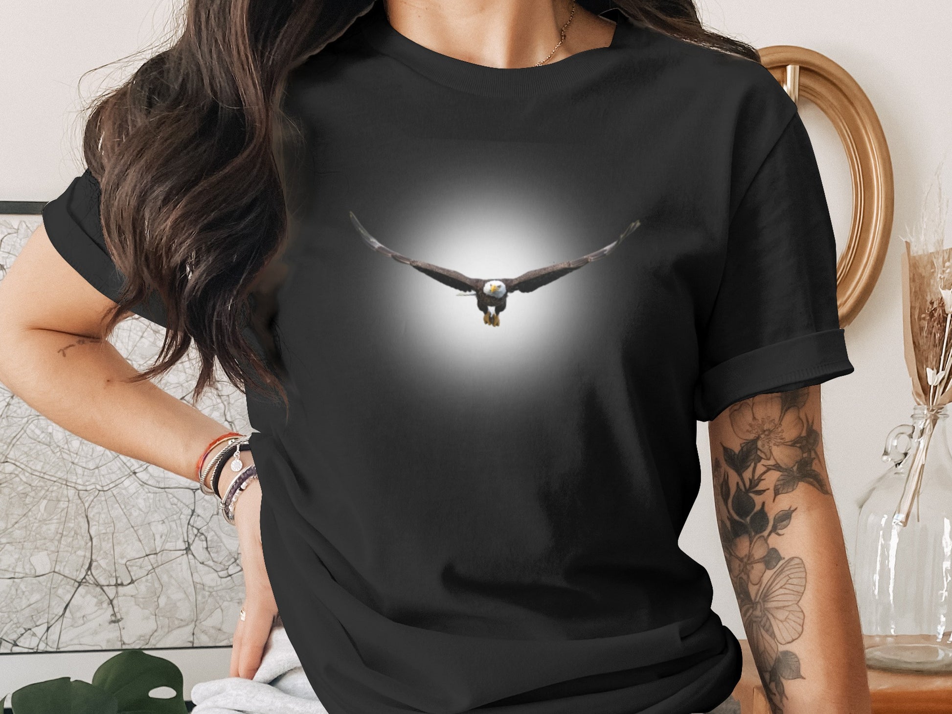 Black t-shirt with a soaring bald eagle graphic centered on the chest.