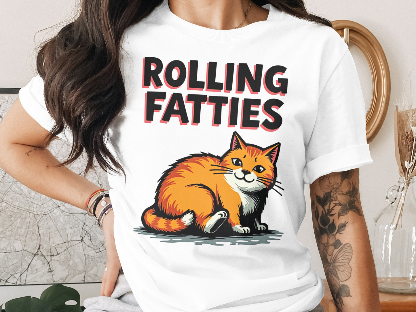 White t-shirt with orange tabby cat and "ROLLING FATZ" text.