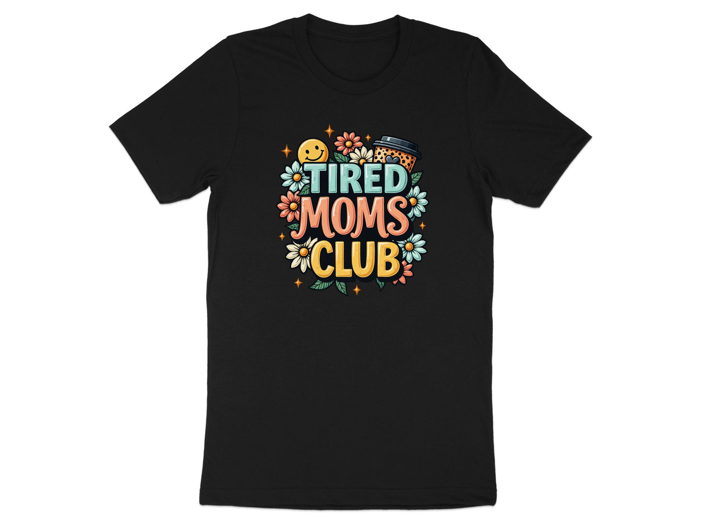 Black t-shirt with "Tired Moms Club" text and floral, smiley face, and leopard print designs.